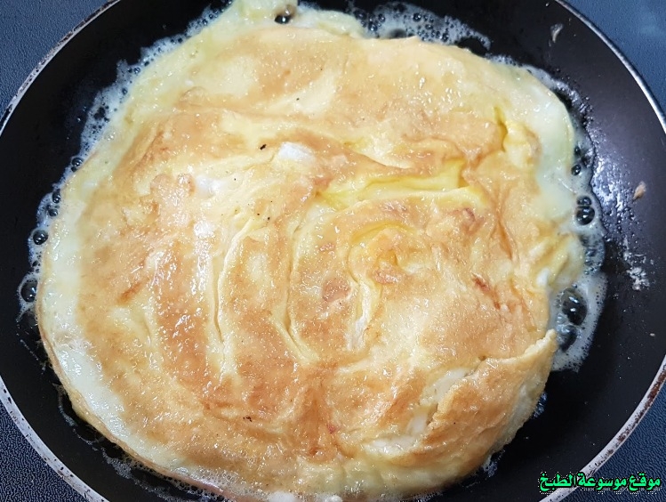 http://photos.encyclopediacooking.com/image/recipes_pictures-bread-omelette-recipe-arabic-style-ejjeh-sandwich5.jpg