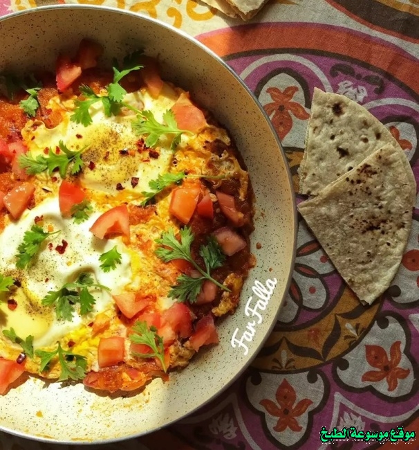 http://photos.encyclopediacooking.com/image/recipes_pictures-egg-shakshuka-with-fresh-tomatoes-recipe12.jpg