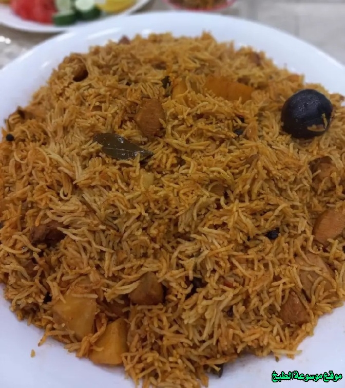 صور طريقة عمل وصفة اكلة مجبوس دجاج أحمر اماراتي famous traditional food in uae with pictures