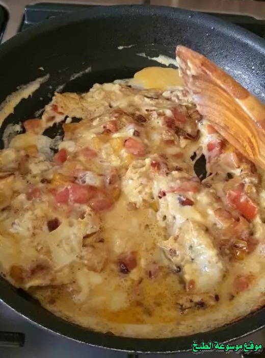 http://photos.encyclopediacooking.com/image/recipes_pictures-how-to-make-shakshuka-eggs-recipe4.jpg