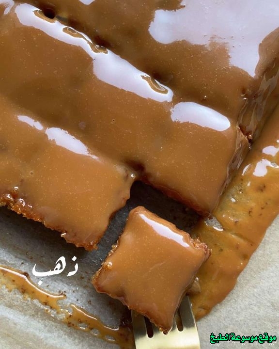 http://photos.encyclopediacooking.com/image/recipes_pictureshow-to-make-saudi-arabian-caramel-basbousa-recipe-in-arabic9.jpg